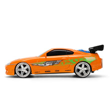 Cargar imagen en el visor de la galería, Coche Radiocontrol Fast & Furious 1995 Toyota Supra 1:24 – Jada Toys