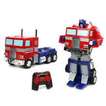 Cargar imagen en el visor de la galería, Camión Radiocontrol Transformers Optimus Prime Converting – Jada Toys

