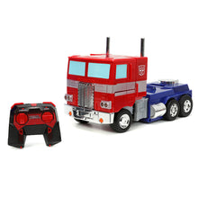 Cargar imagen en el visor de la galería, Camión Radiocontrol Transformers Optimus Prime Converting – Jada Toys
