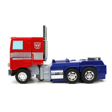 Cargar imagen en el visor de la galería, Camión Radiocontrol Transformers Optimus Prime Converting – Jada Toys

