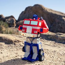 Cargar imagen en el visor de la galería, Camión Radiocontrol Transformers Optimus Prime Converting – Jada Toys
