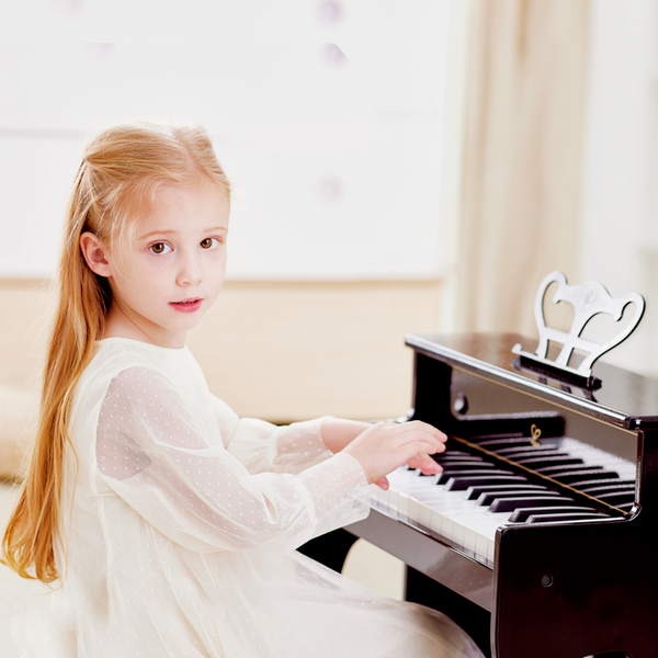 Piano infantil Hape con Taburete